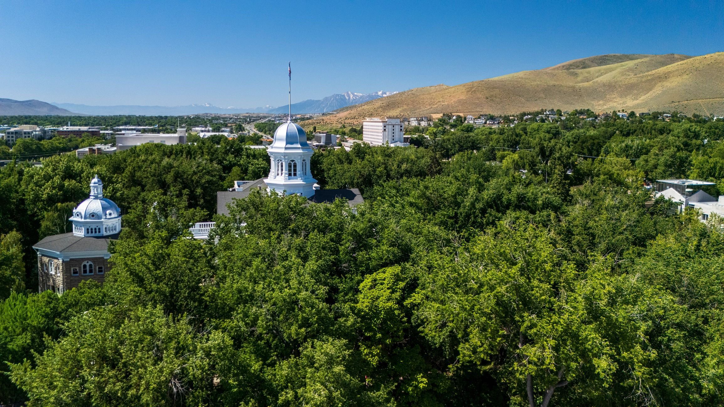 Aerial view of Carson City, Nevada with the State Capitol and surrounding landscape